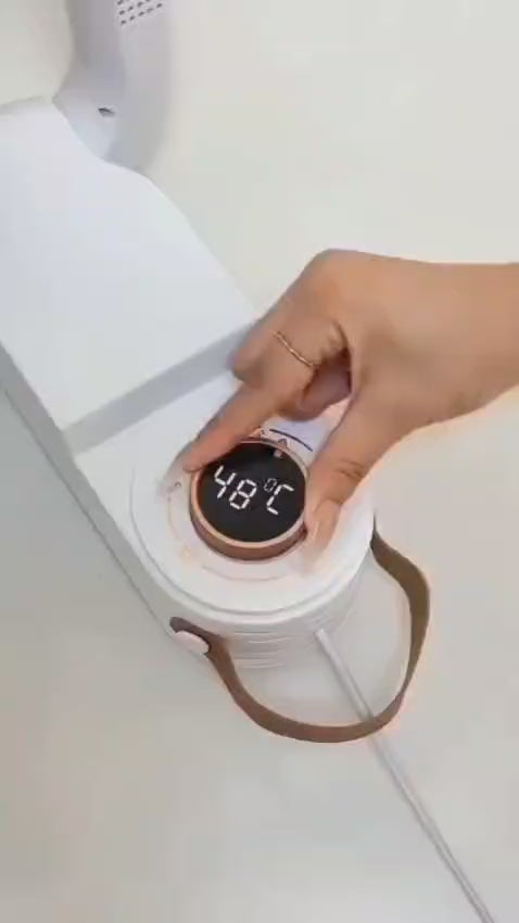 Electric Shoe Dryer With a Timer and Temperature Control.